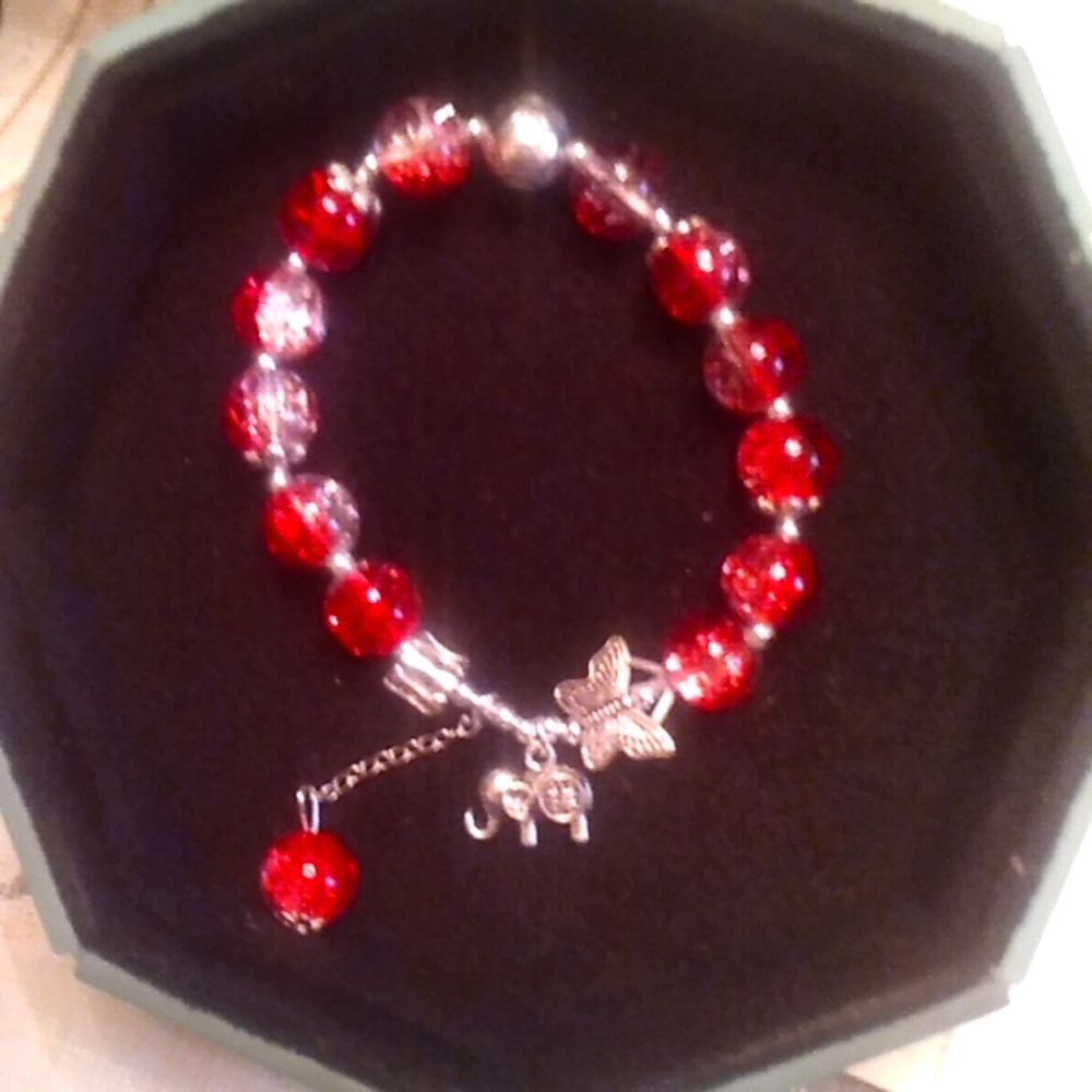one size fits all beautifully made glass beads with elephant charm butterfly har